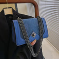 Sac bandoulière chaîne embossé façon croco